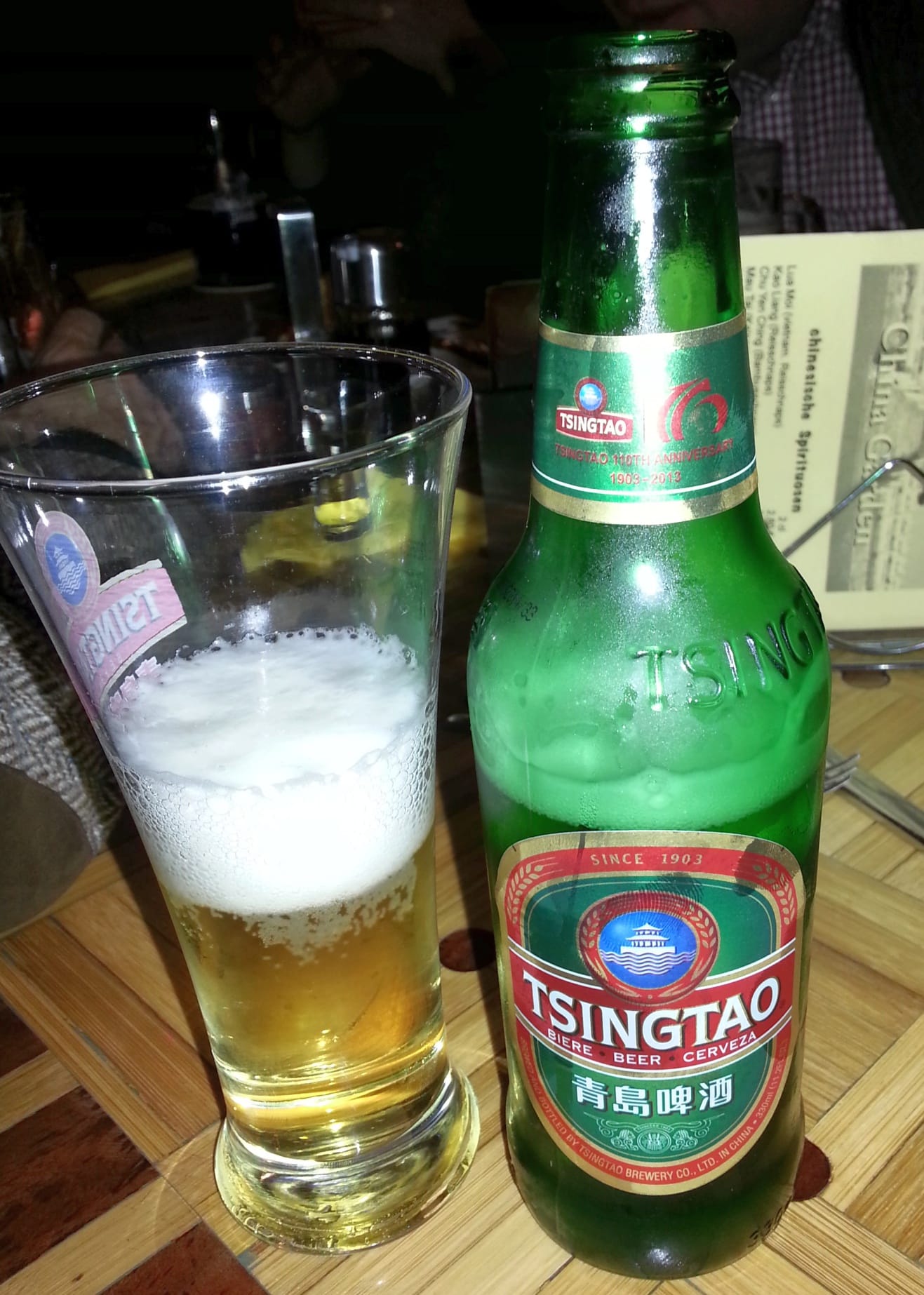 Photo de Tsingtao, Lager Chine 4.7% — brassée par Tsingtao Brewery